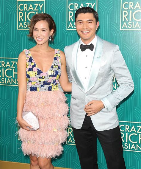 henry golding and his wife.